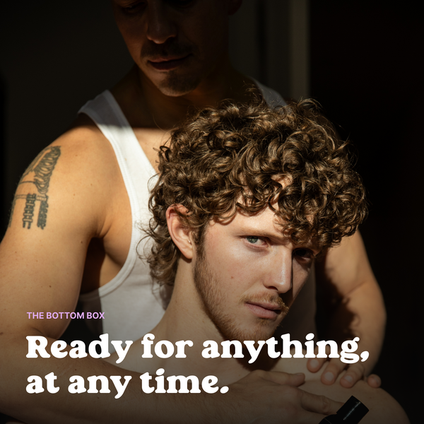 Man resting against his partner: the Bottom Box, ready for anything, at any time