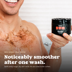 Man in the shower with BUM Coffee Scrub on his chest, holding the jar; skin feels smoother after one wash